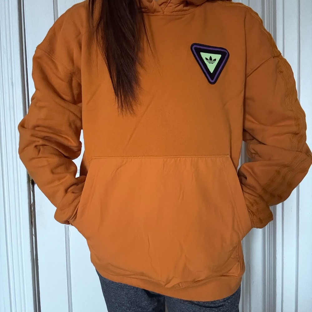 Adidas IVY PARK Orange Hoodie with Logo Patch